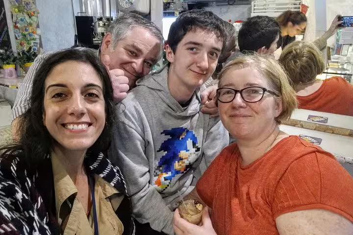 Happy group enjoying desserts on a guided tour near Pantheon Navona and Campo de Fiori in Rome