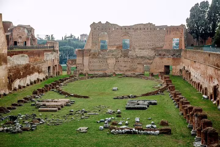 Ancient Roman ruins in the Roman Forum, showcasing historic architecture included in the Rome Colosseum and Castel Sant'Angelo tour.