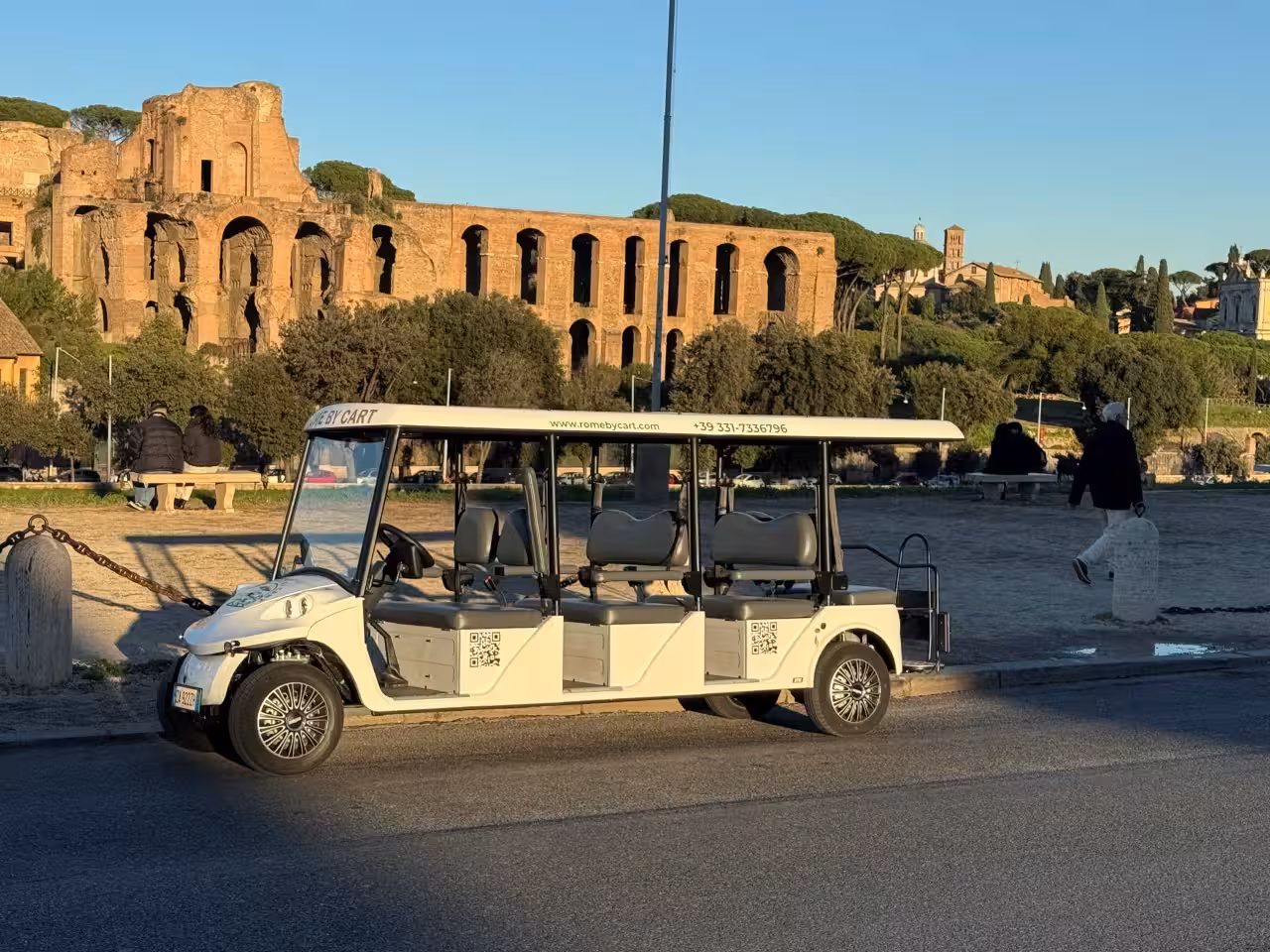 Golf cart tour in Rome at sunset near Gianicolo viewpoint, ideal for Trastevere guided ride and panoramas