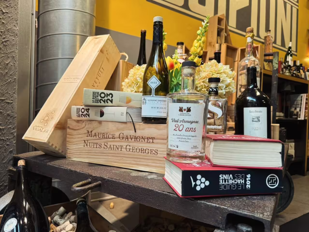 Premium Italian wines and aged Armagnac display at Magazzino Scipioni, Rome gourmet tasting tour