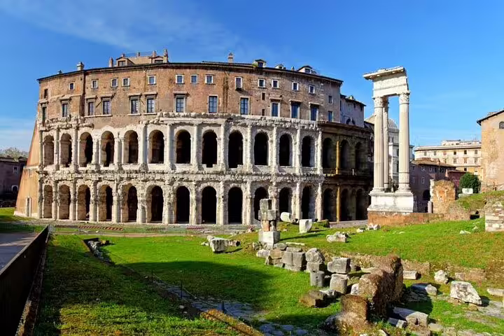Ancient ruins of the Theatre of Marcellus seen on a Rome hop on hop off bus route combined with a Vatican Museums Sistine Chapel tour
