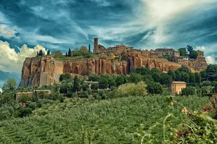 Scenic hilltop view of Orvieto perched on volcanic rock reachable via private transfer from Rome with professional driver