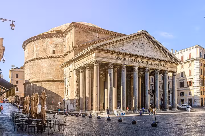 Pantheon in Rome on a guided walking tour, with hosted access to Vatican highlights and city landmarks