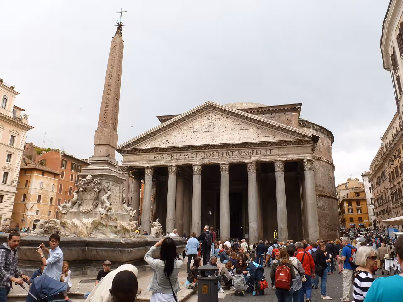 Crowds gather in front of Rome's iconic Pantheon and the ancient Egyptian obelisk in Piazza della Rotonda.