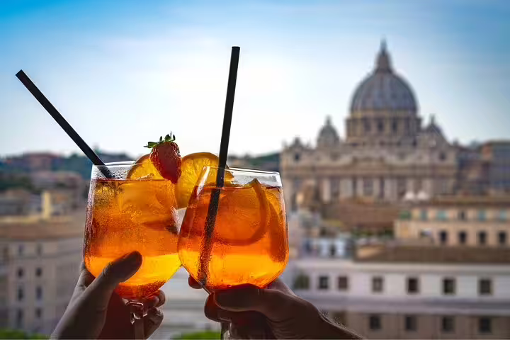 Savor Italian aperitivo drinks with stunning Vatican views on a private foodie tour, blending culture and cuisine in Rome.