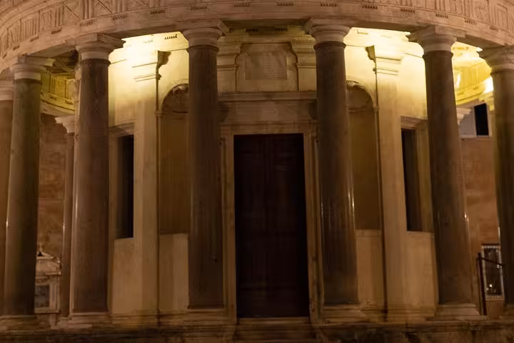 Discover the illuminated architecture of Tempietto during the Rome Trastevere Walking Food Tour.