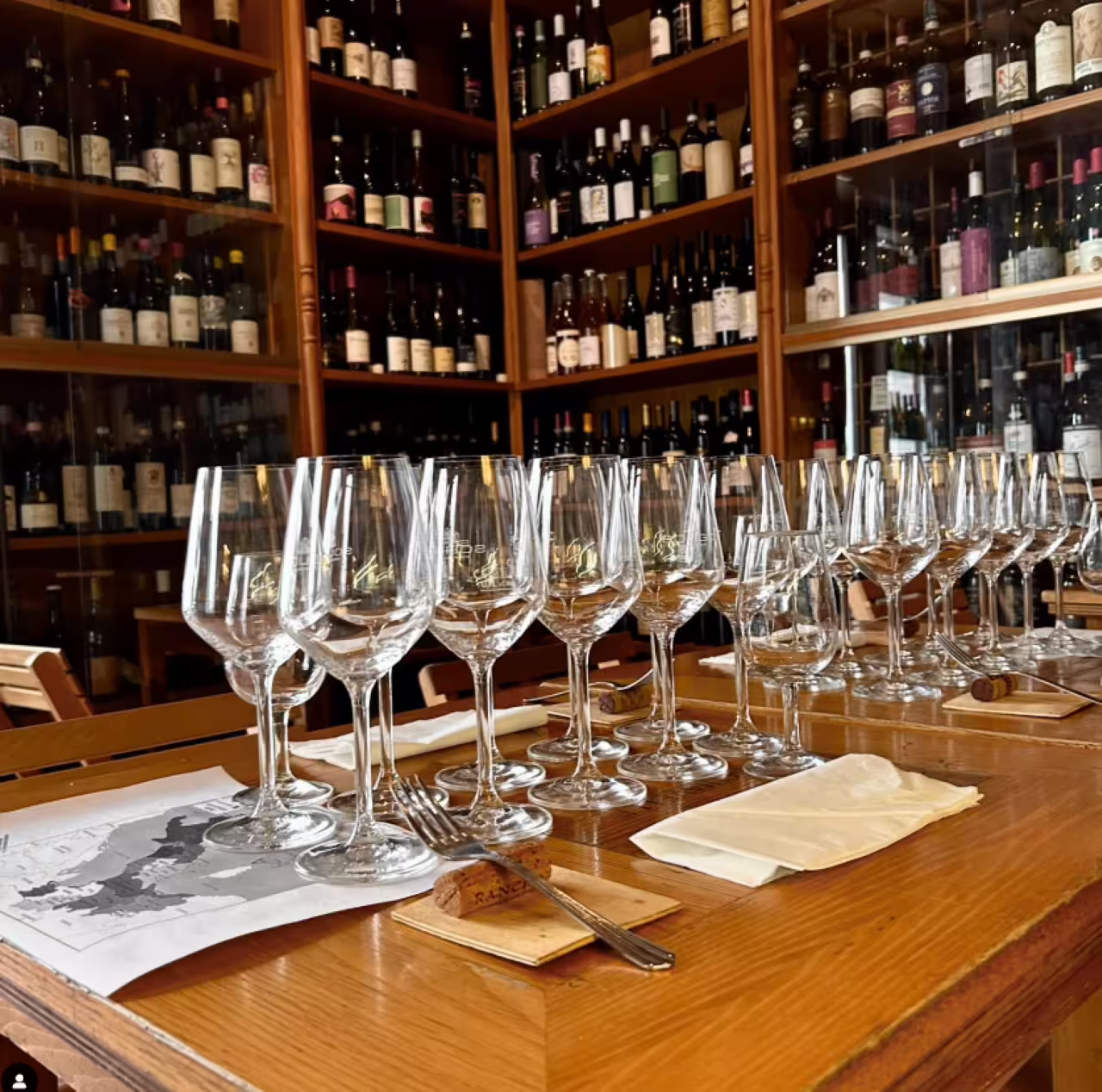 Set wine glasses in a Rome city center wine bar for an exclusive guided Italian wine tasting experience
