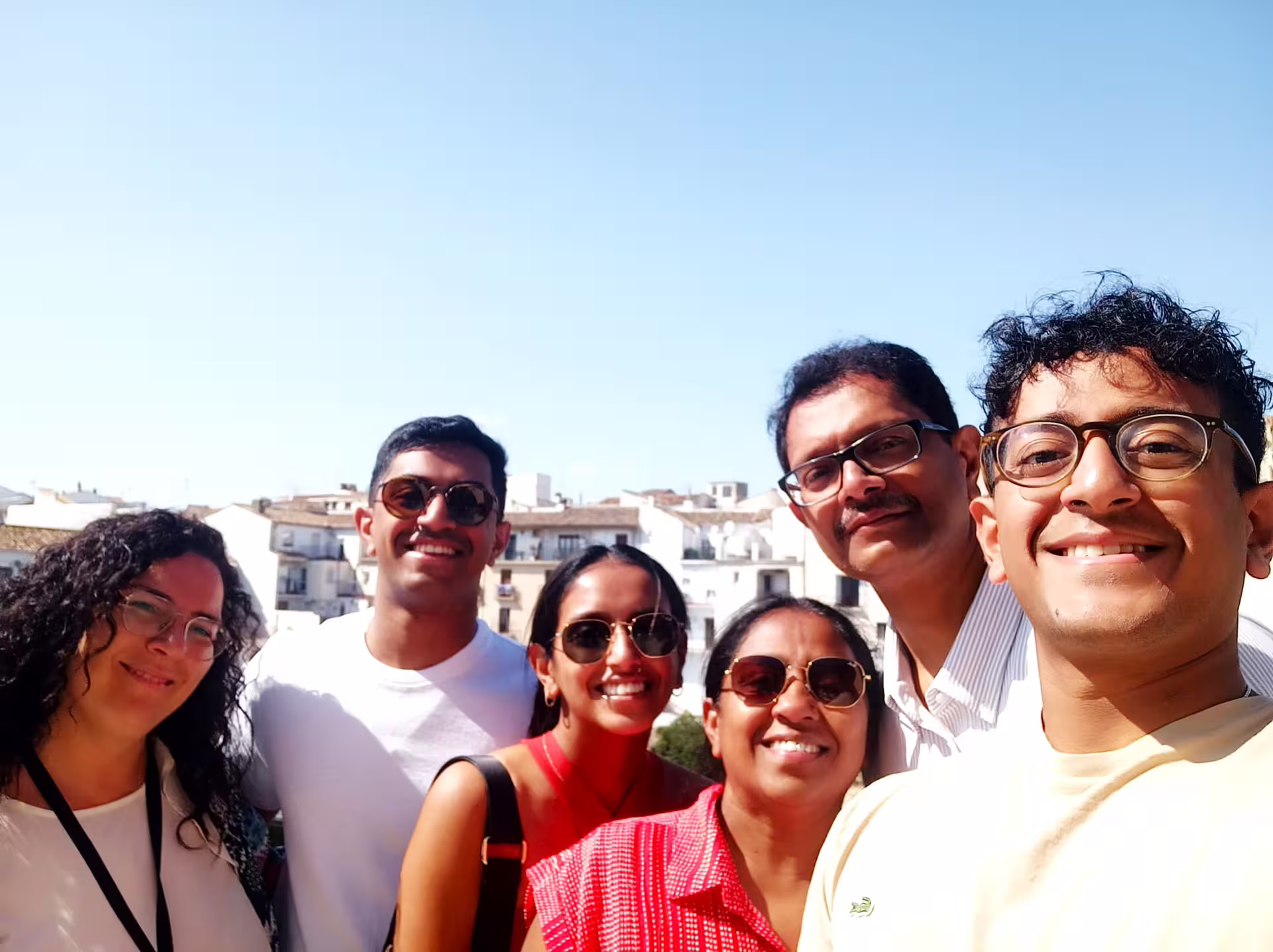 Happy travelers selfie in Ronda old town viewpoint on private trip from Costa del Sol with local guide