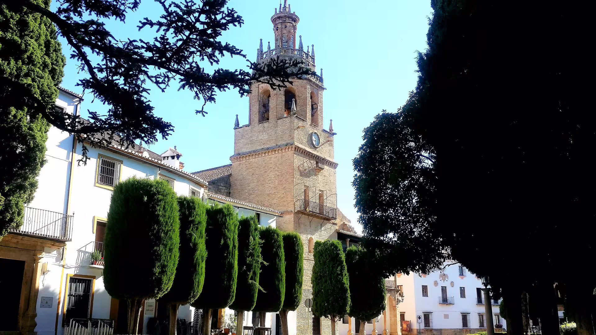 Ronda historic church tower in Andalusia on guided group tour from Malaga with hotel pick-up