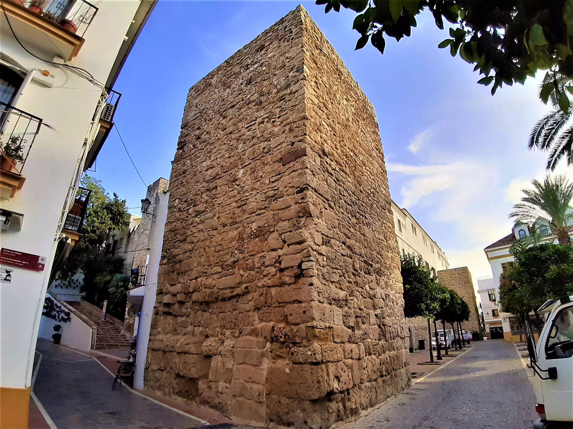 Ancient stone tower in Ronda old town on a private day trip with hotel pick-up from Marbella or Malaga