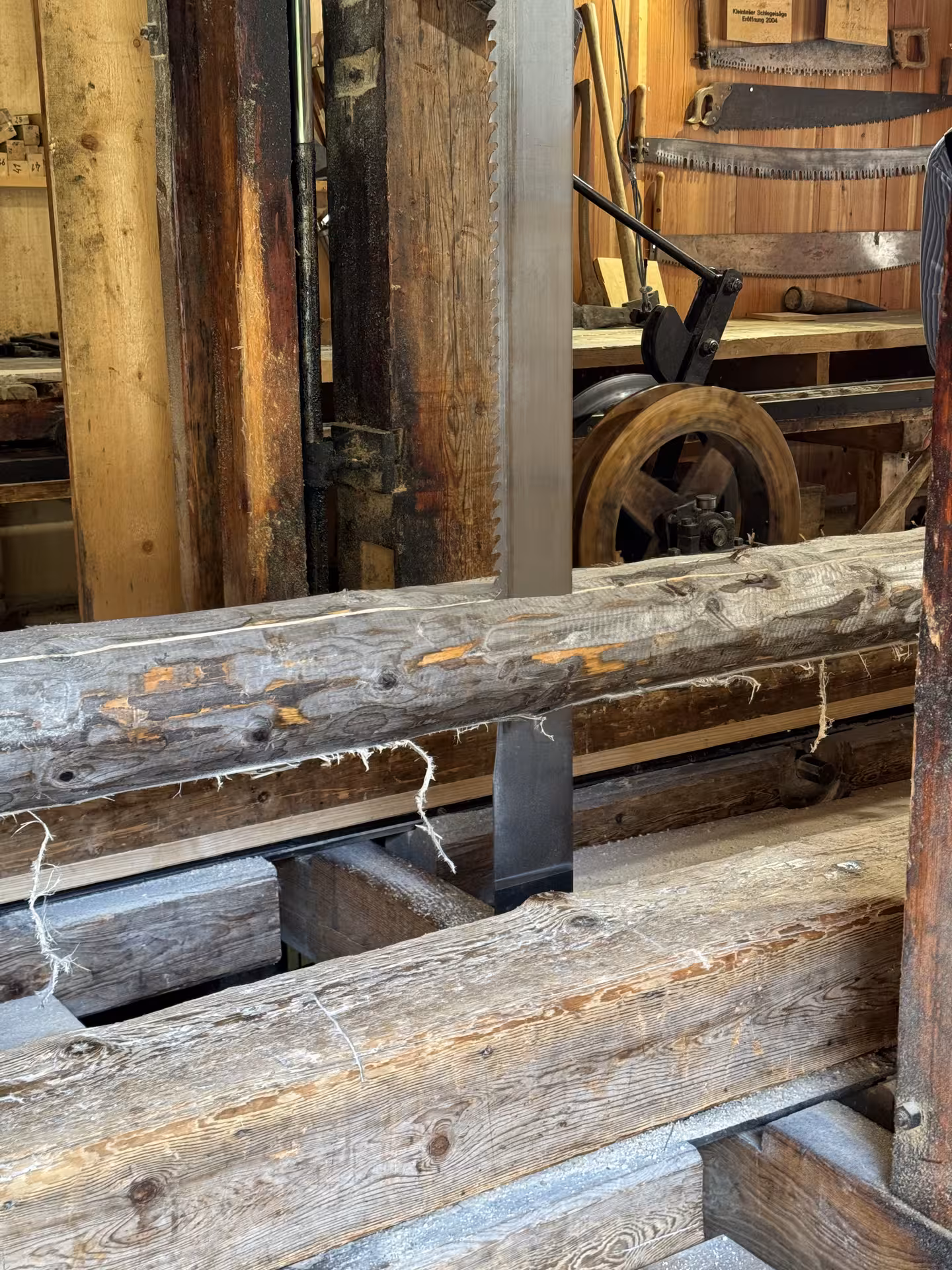 Traditional Swiss sawmill interior stop on Private Rosenlaui Valley e-bike tour near Meiringen, Bernese Oberland