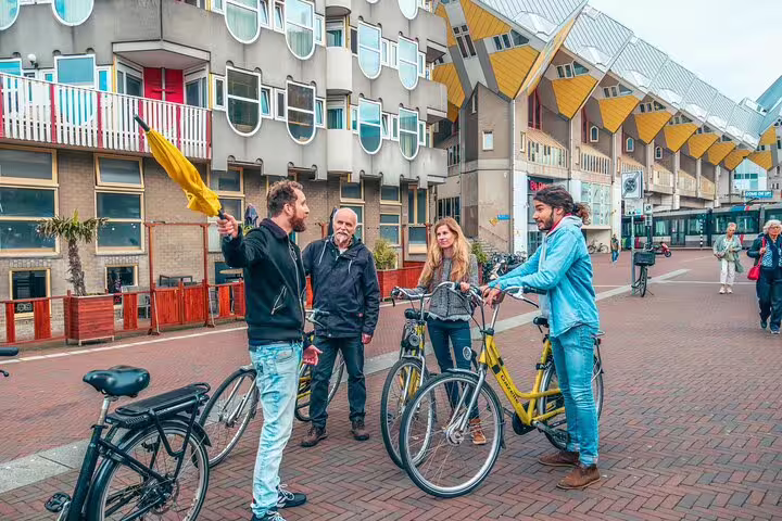 Group stops at Rotterdam Cube Houses for a classic highlights bike tour with a local guide and city tips