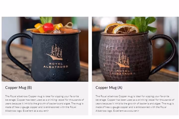 Elegant Royal Albatross copper mugs with logo, perfect for beverages, highlighting craftsmanship ideal for souvenirs.