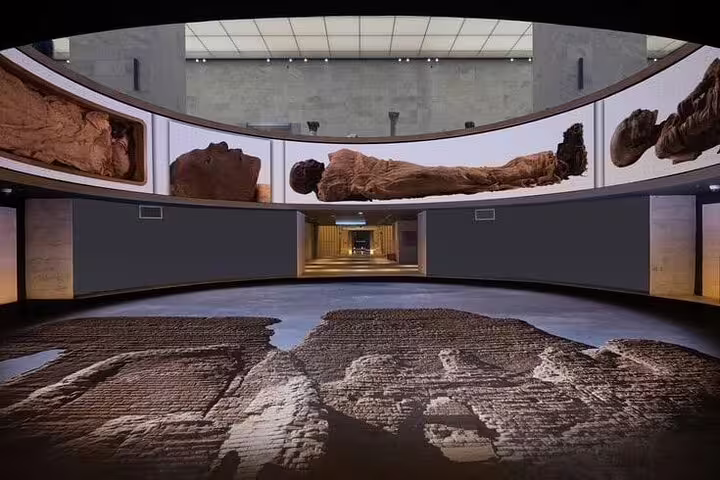 Royal Mummies Hall display at NMEC Cairo, included in Alexandria Port to Giza Pyramids private tour