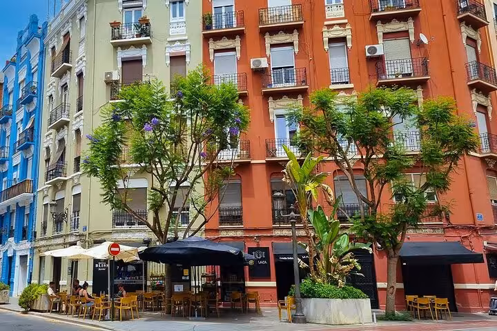 Colorful Ruzafa Valencia street with terrace bars, ideal stop on evening tapas, wine and local secrets tour