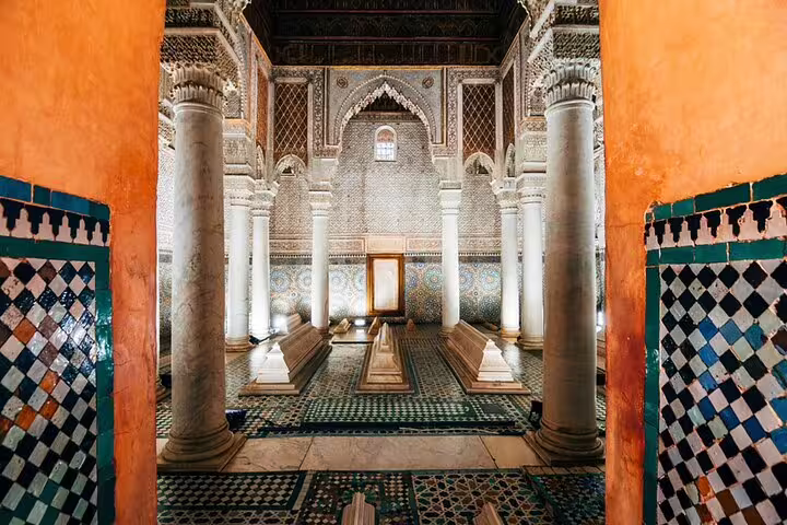 Saadian Tombs interior with marble columns and mosaic tiles in Marrakech, visited on a full-day local guided tour