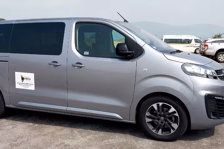 Comfortable safari transport van ready for Sabi Sands Sunset Safari adventure, ensuring a smooth and scenic journey.
