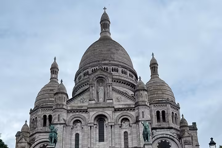 Sacré-Cœur Basilica dome and facade with equestrian statues, Montmartre Paris