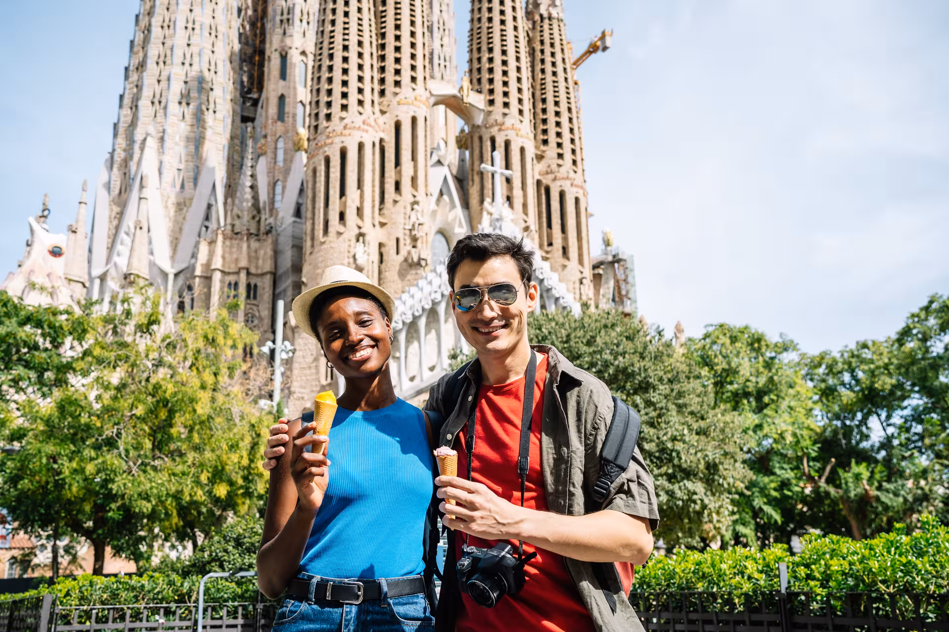 Illustrated artwork of Sagrada Familia basilica with colorful spires and ornate facade in Barcelona