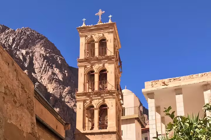 Saint Catherine Monastery bell tower under blue sky, visited on private overnight Mount Sinai tour from Cairo