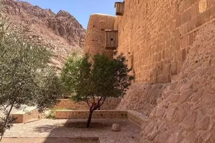 Stone courtyard and ancient walls at Saint Catherine’s Monastery, Sinai, on Sharm El Sheikh day trip