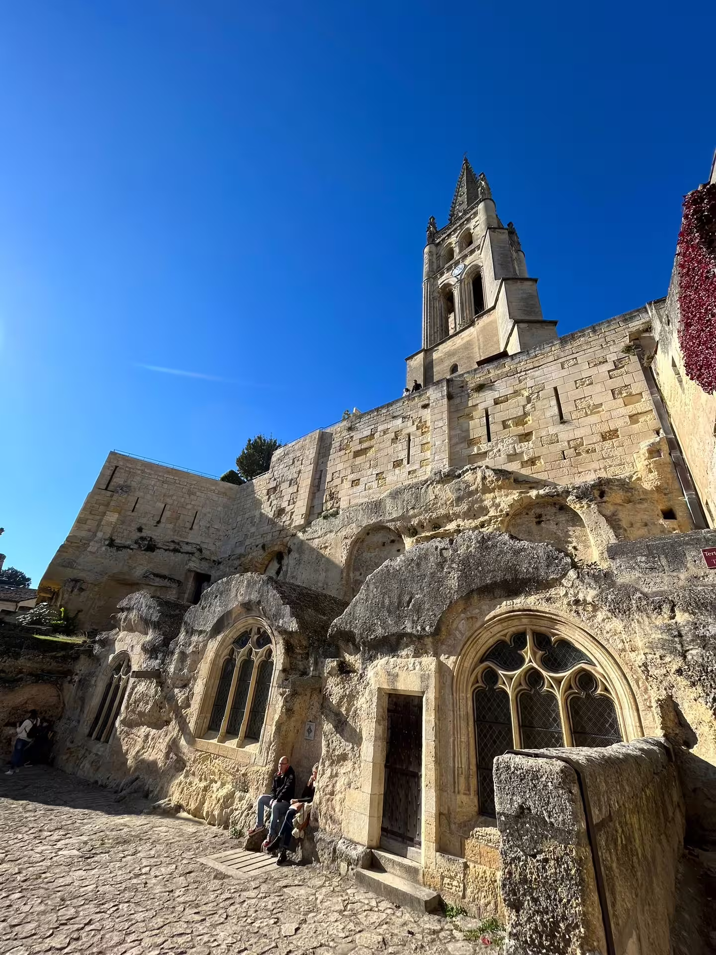 Monolithic Church and limestone caves in Saint-Émilion on guided walking tour with underground tasting