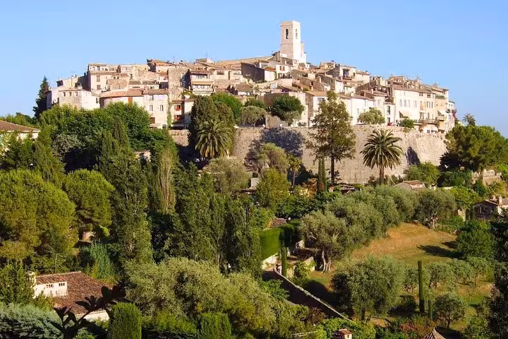 Hilltop medieval village of Saint-Paul-de-Vence surrounded by lush greenery, French Riviera