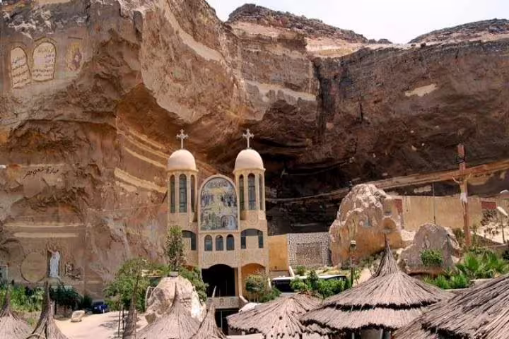 Monastery of Saint Simon in Cairo’s Mokattam cliffs, a scenic stop on the overnight Luxor to Cairo VIP train tour