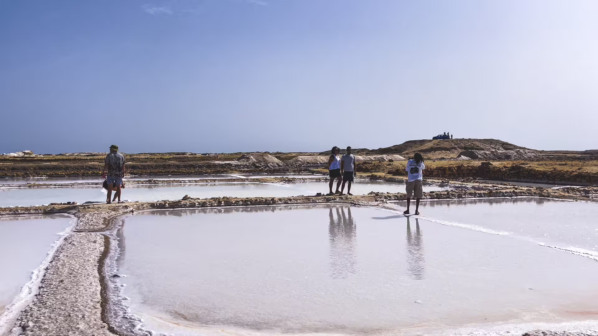 Group visits the Pedra de Lume salt pans, a highlight of the all-inclusive full-day Sal Island tour with lunch