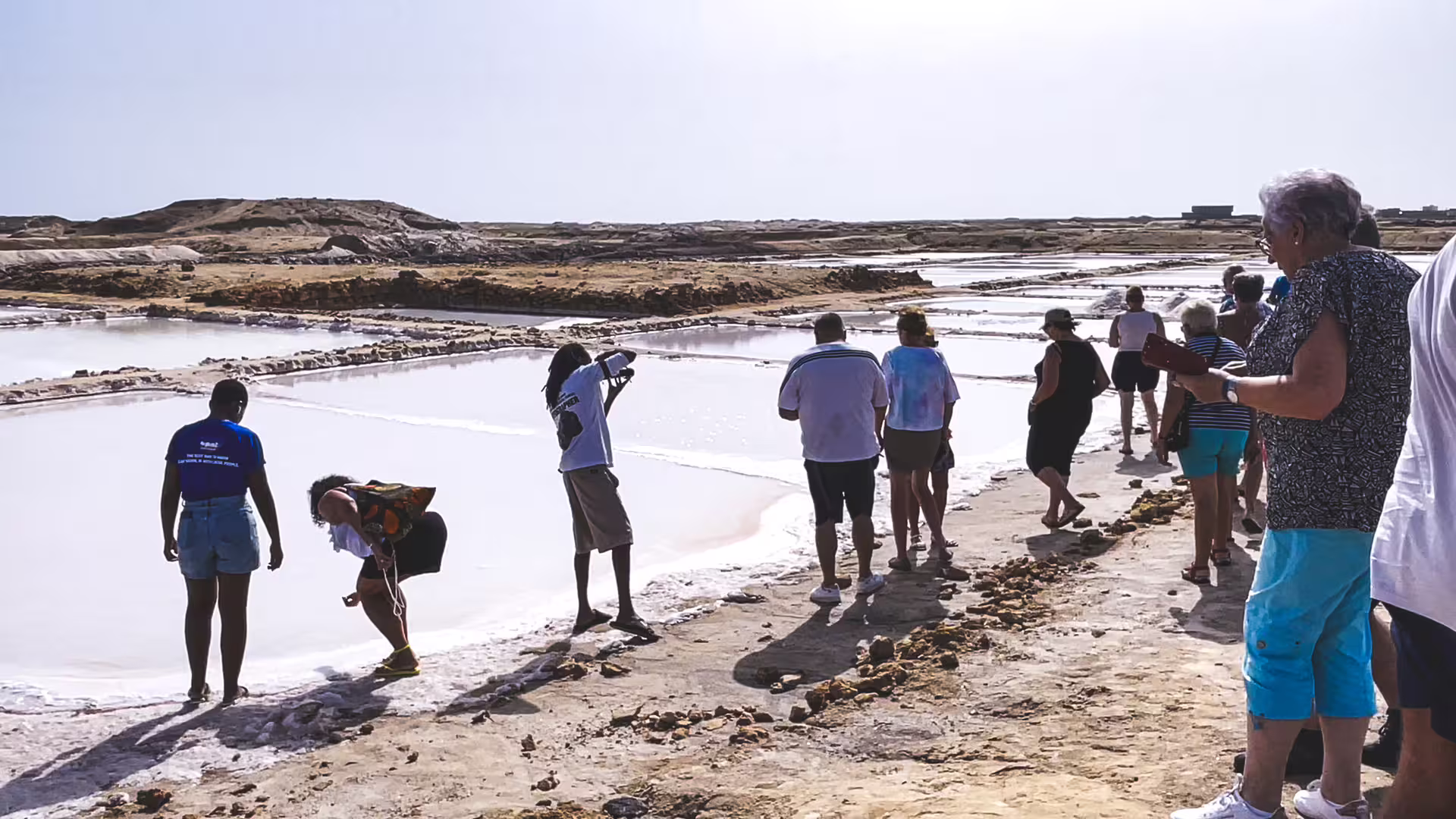 Tour group exploring Pedra de Lume salt pans on Sal Island, Cape Verde, full-day all-inclusive excursion with fees