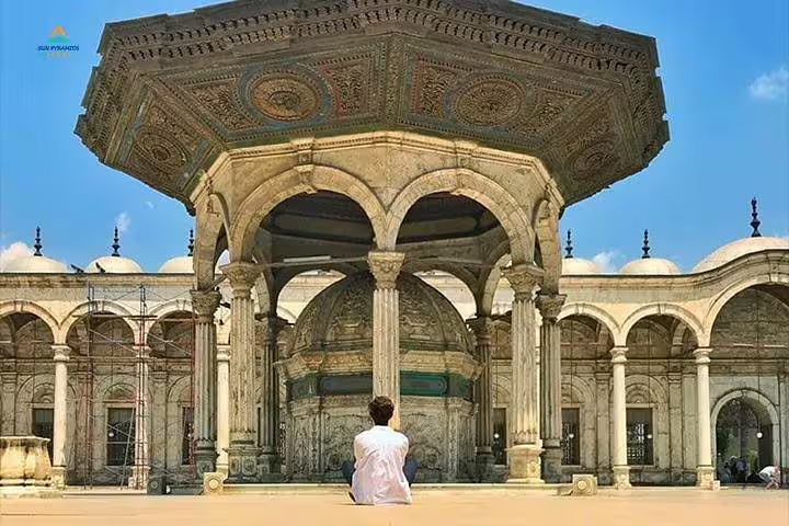Visitor at Saladin Citadel Cairo with ornate ablution fountain, 2-day Alexandria to Giza Cairo trip