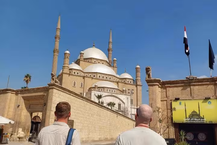 Visitors at Saladin Citadel in Cairo with the Mosque of Muhammad Ali on a private guided tour itinerary
