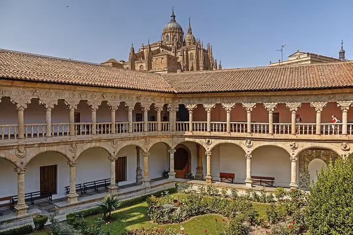 Historic courtyard of the University of Salamanca, a notable stop on the 7-day Castilla and Portugal tour from Madrid.