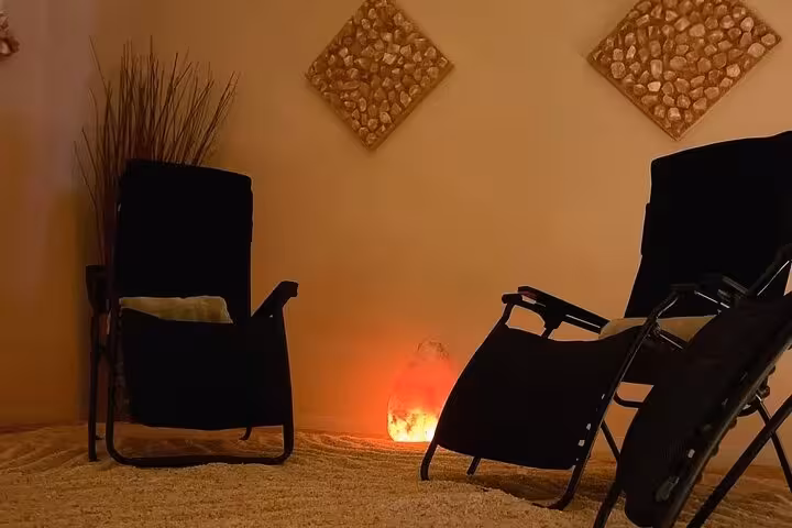 Cozy salt cave lounge with recliners and glowing salt lamp, Sharm El Sheikh salt cave and local shopping trip
