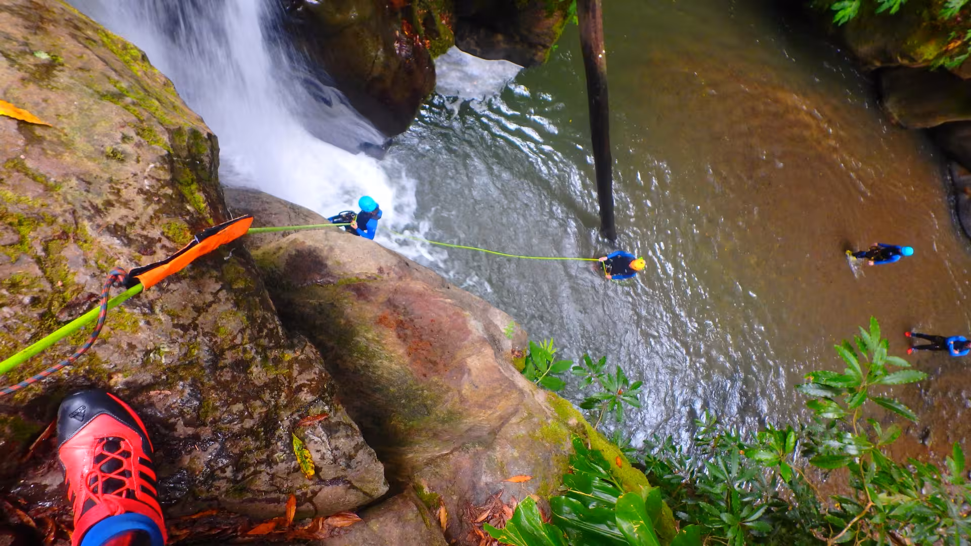 Salto do Cabrito canyoning in the Azores with rope rappel into natural pool, full-day guided tour with transport
