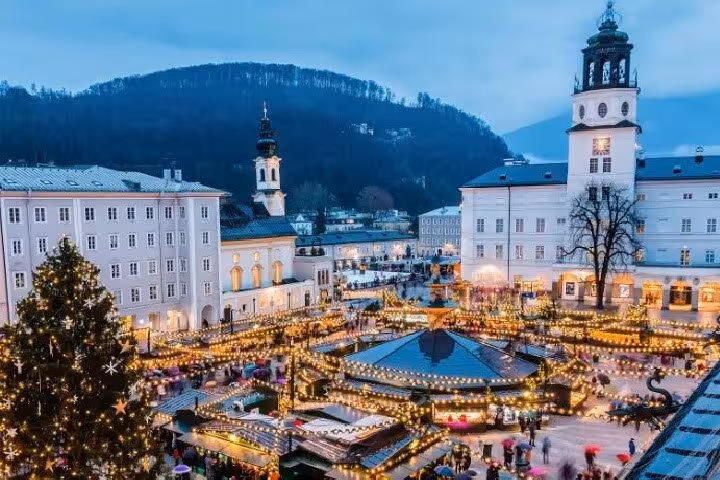Salzburg Old Town Christmas market lights at Residenzplatz, highlight on private day tour from Vienna