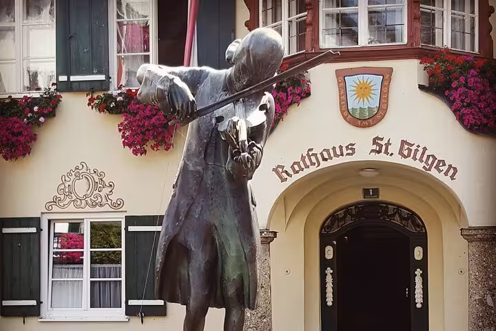 St. Gilgen Mozart violinist statue by the Rathaus, a stop on the Salzburg small-group day trip from Vienna