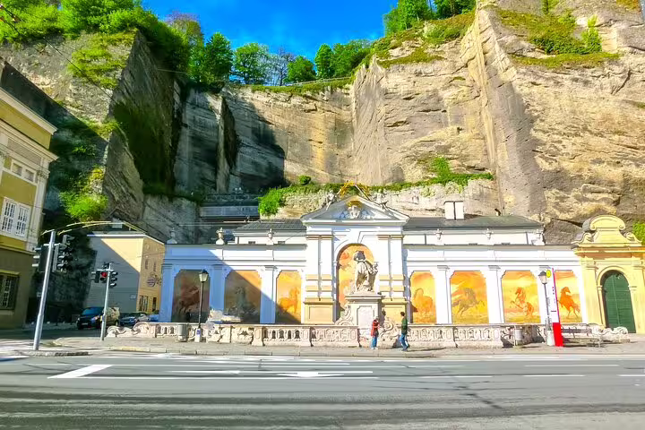 Baroque Pferdeschwemme horse fountain with murals built into Salzburg cliff face