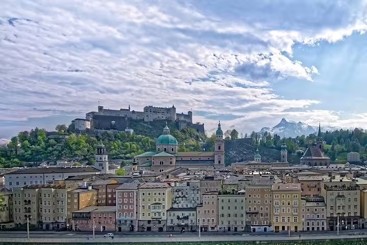 Panoramic Salzburg skyline with Hohensalzburg Fortress and Alps, private Salzburg day trip from Vienna