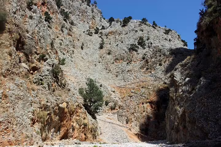 Explore the rugged beauty of Samaria Gorge's rocky terrain on the 8 Days Hiking Tour in Southwest Crete from Chania.