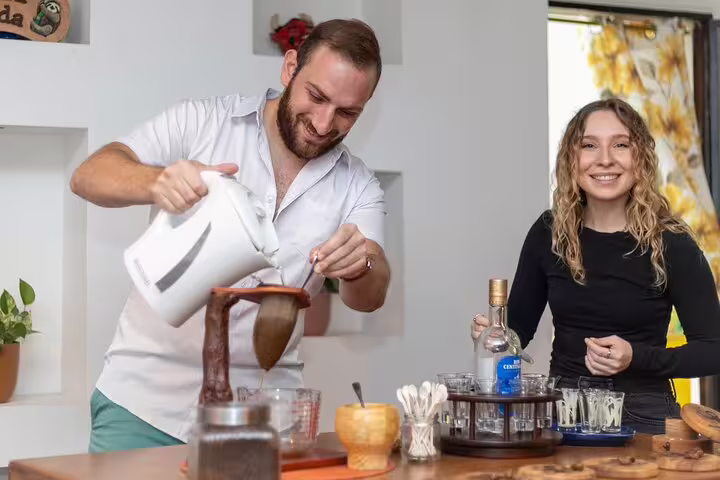 Guests enjoying a cocktail class on the San Jose By Night tour, learning to craft drinks with locally sourced ingredients.