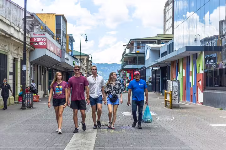 Group enjoying San Jose's vibrant streets on a Bites and Sights Walking Food Tour, showcasing local culture and attractions.