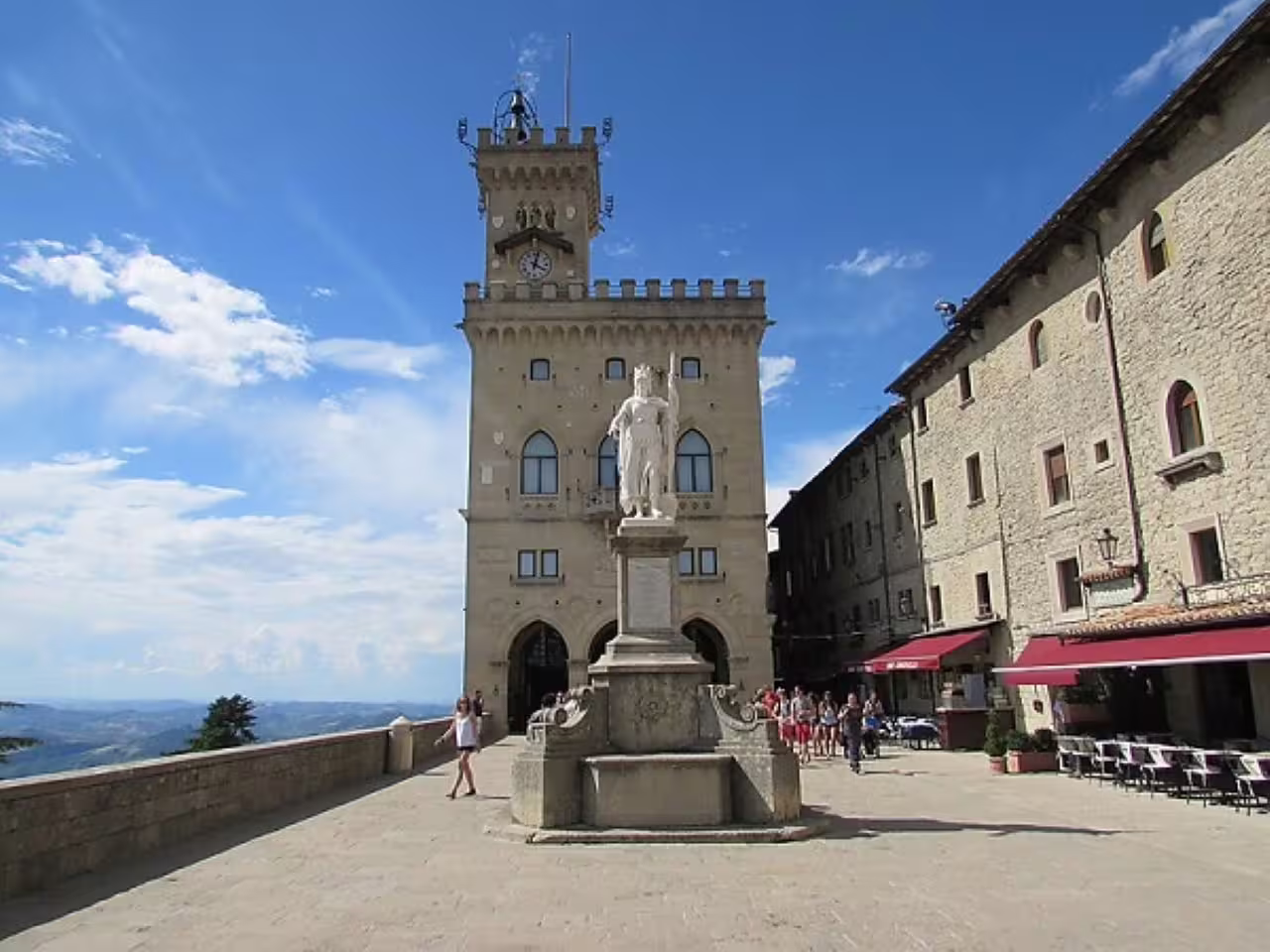 Visit San Marino's Palazzo Pubblico, a medieval architectural gem, highlighting cultural heritage and stunning vistas.