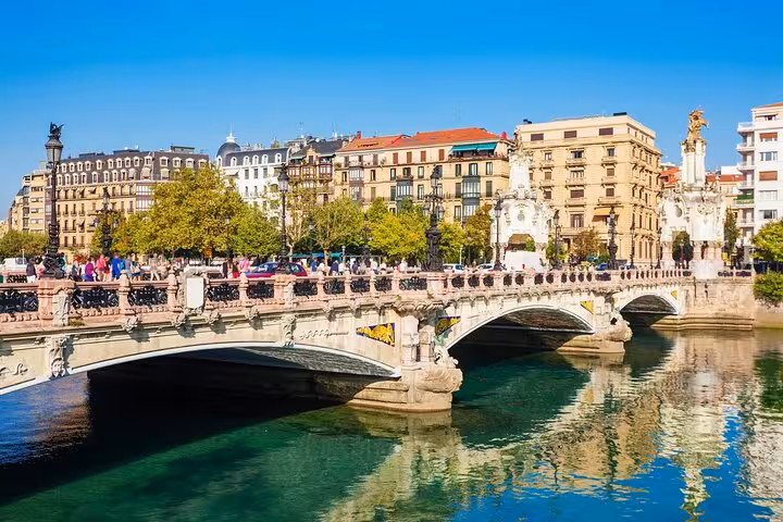 Scenic view of San Sebastian's iconic bridge and vibrant architecture on a private two-hour city walk tour.