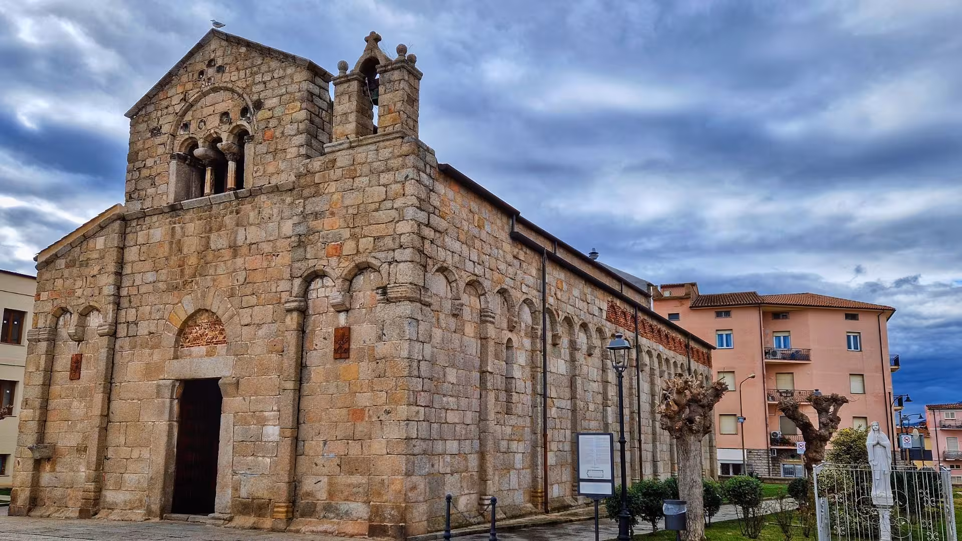 Explore the historic San Simplicio Basilica in Olbia, showcasing Romanesque architecture on your guided tour with aperitif.