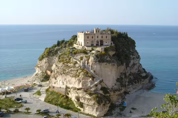 Sanctuary of Santa Maria dell’Isola perched on a rocky promontory above Tropea beach on the Tyrrhenian Sea coast