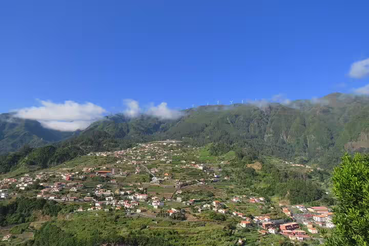 Scenic view of Santana's lush green valleys and traditional houses under a clear blue sky on the Northeast 4WD Experience tour.