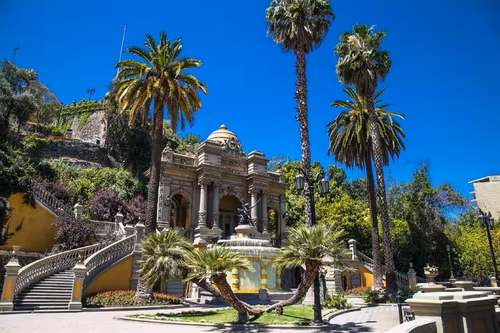 Neoclassical fountain and palm trees at Cerro Santa Lucía hill park in Santiago, Chile