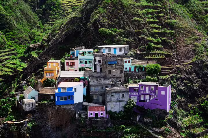 Colorful hillside village in Santo Antão offering stunning views and cultural immersion on discovery tours.