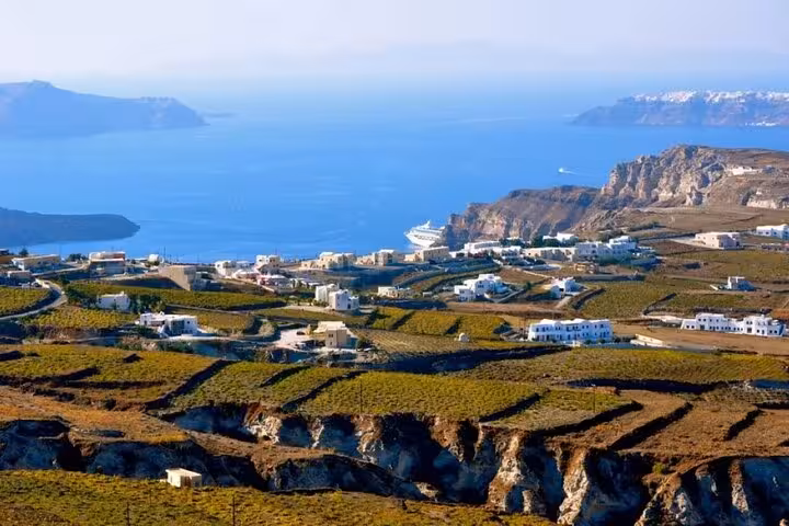 Santorini terraced vineyards overlooking the caldera, scenic stop on Greece Wine Roads Athens Nemea tour